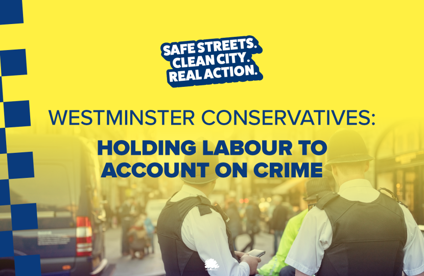 Two police men looking down street