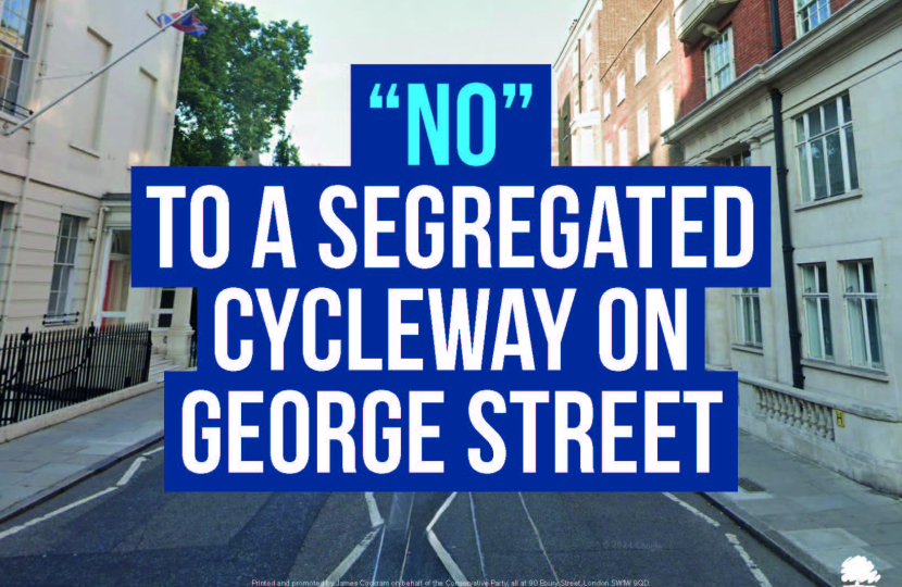 A street scene with the words: NO TO A SEGREGATED CYCLEWAY ON GEORGE STREET in bold white and blue text over the image, highlighting the stance of local Conservatives