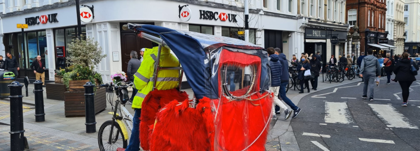 Pedicab on pavement in Westminster