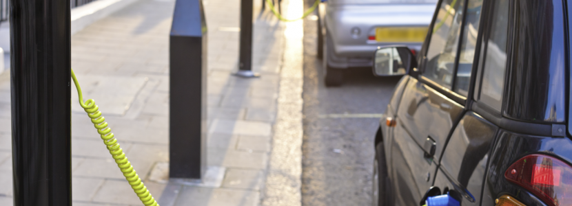 Stock image of electric car cbeing charged