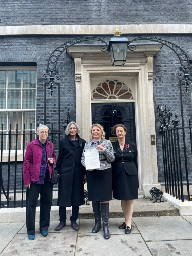 Presenting the petition at Downing Street